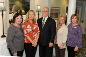 Executive Director of Allerton House at Harbor Park Tom Karnes (center) takes a moment for a photograph with some of the many professionals who refer their clients to the Hingham assisted living community. They are from left to right: Gerry Sanderson, RN, Norwell VNA & Hospice; Noreen Cataldo, RN, BSN, CCM, director of business development, NVNA & Hospice; Tom Karnes; Joan Wright, CDP, director of community relations, Norwell VNA & Hospice; and Christine McDonough, director, NVNA Works.