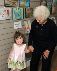 Resident Kathleen Schirf enjoyed sharing her watercolor paintings with her granddaughter Allison at the Art Show.