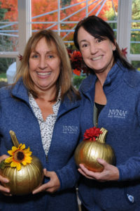 Healthcare professionals with pumpkins they decorated