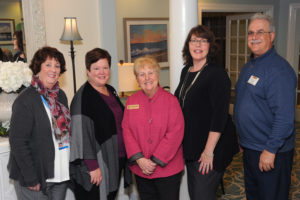 Gathering for a photograph before the presentation are (left to right) Karen Gray, RN, Manager of Performance Management, Brigham and Women's Harbor Medical Associates; Ellen Steward, Manager, Client and Physician Relations, Brigham and Women’s Hospital; Lynda Chuckran, Director, Community Relations, Welch Senior Living; and from Allerton House in Hingham, Marketing Director Carol Taylor and Executive Director Tom Karnes.