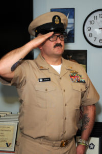 U.S. Navy Senior Chief Petty Officer salutes veterans living at Allerton House in Hingham