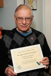 United States Army veteran Richard Raczkowski holds his certificate of appreciation.