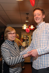 Hingham High School student volunteer Nick Johannes and resident Ruth Welby take a turn on the dance floor!