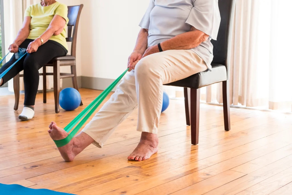 senior women use resistance bands in their exercises after knee replacement